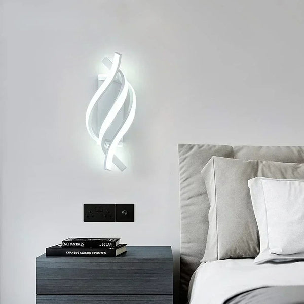 LuminousSpiral_wall_lamp_above_bed.